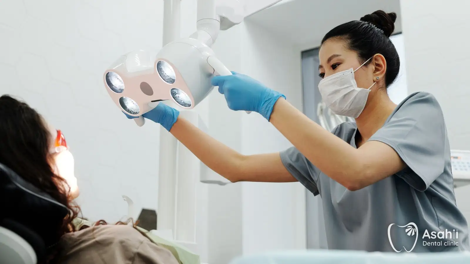 A dentist preparing for root canal treatment to save an inflamed tooth