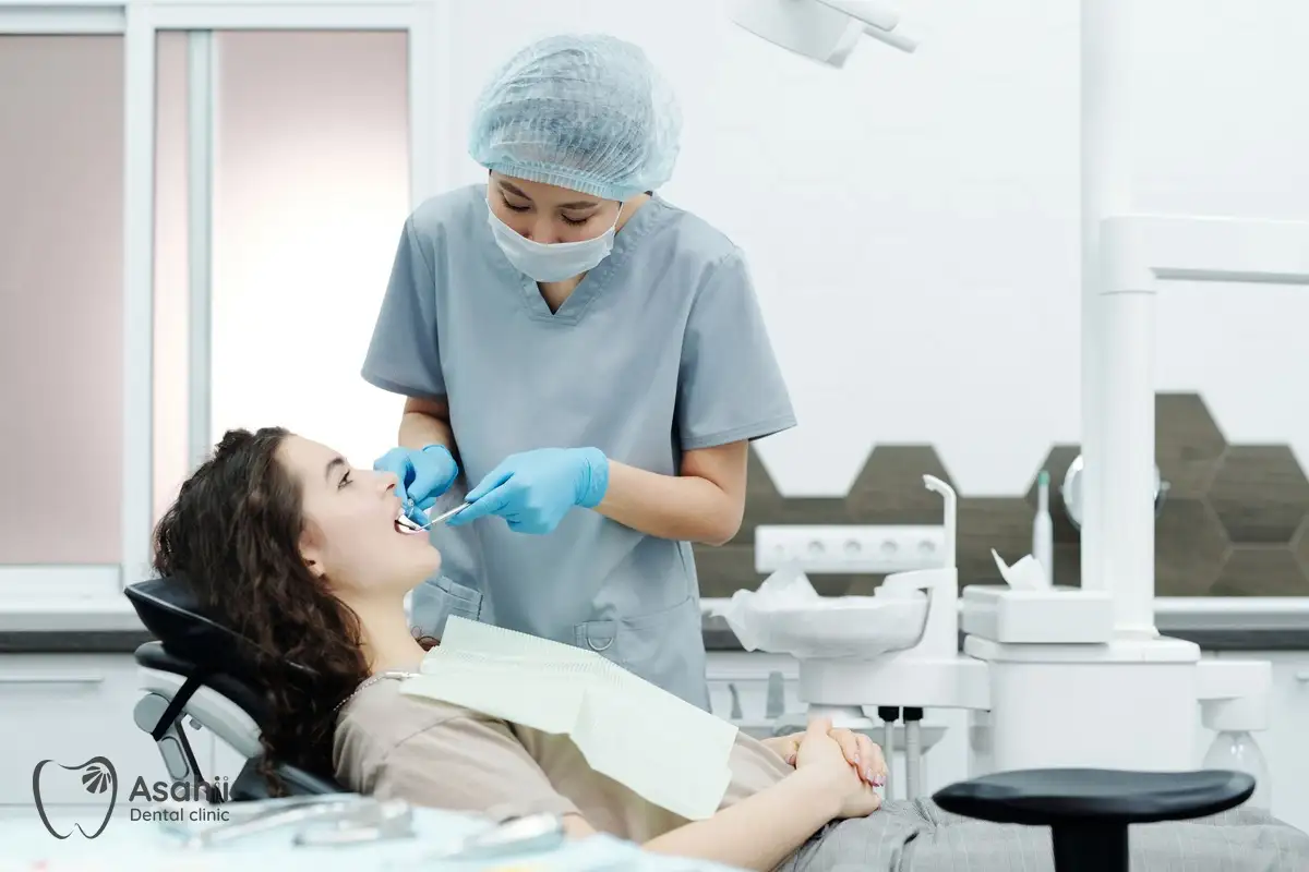 The dentist looks for the cause of sensitivity, such as worn enamel, receding gums or decay