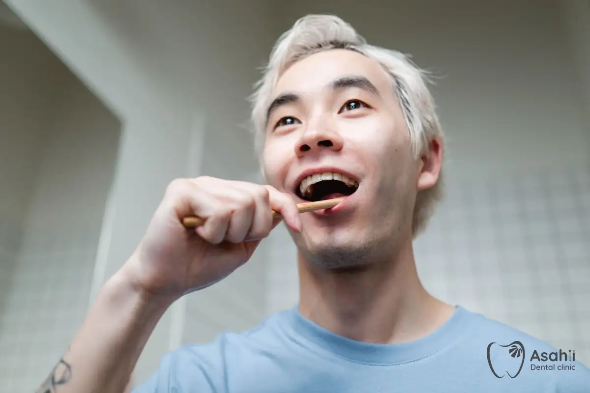 Brush gently for at least two minutes, with the brush angled at 45 degrees to the gums