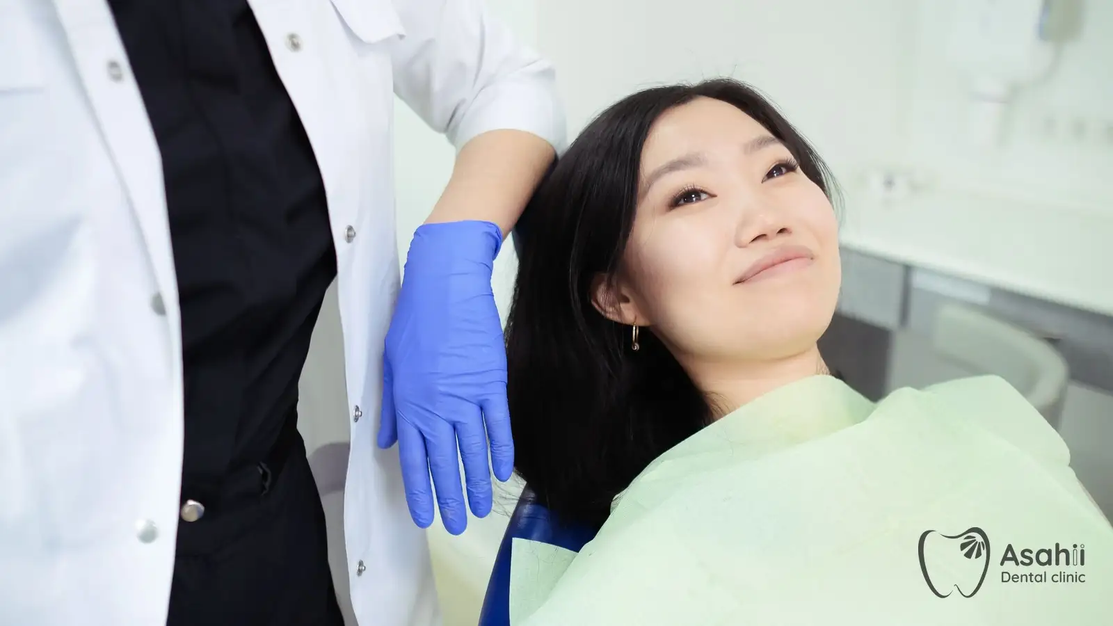 A patient being advised on whether veneers or crowns suit them